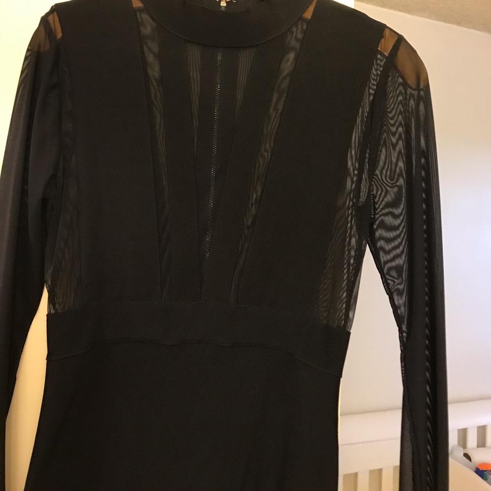 Beautiful BEBE Dress. It’s sexy and classy.